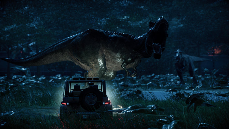 A single jeep squares off against two large T.rex predators, it is raining, so the radio is probably silent